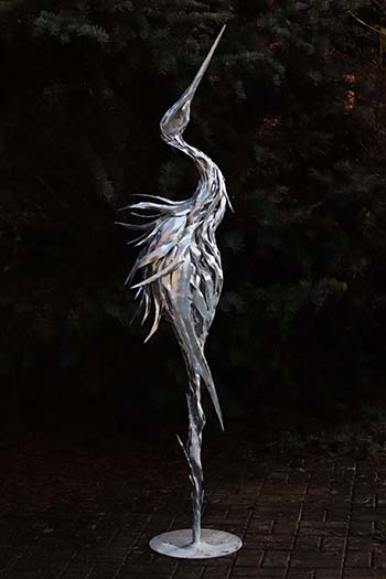 socha do zahrady volavka-rozcepirena
