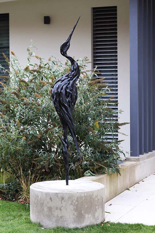 Kovaná socha Volavka černá